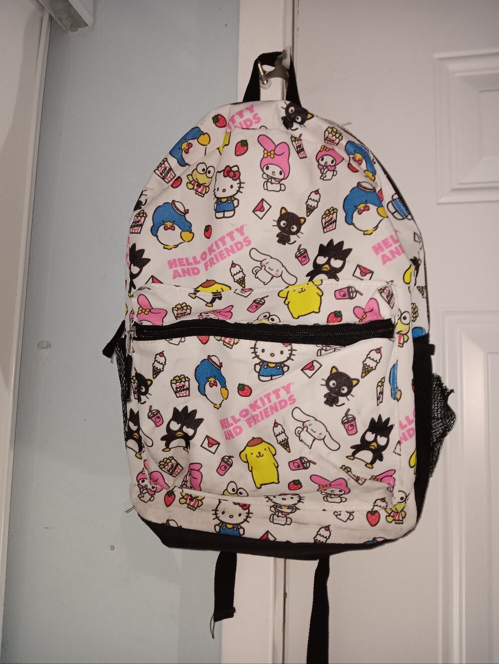 Sanrio White Backpack with Pink, Blue, Yellow and Black Character Print